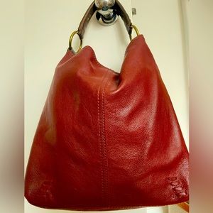 Red leather handbag